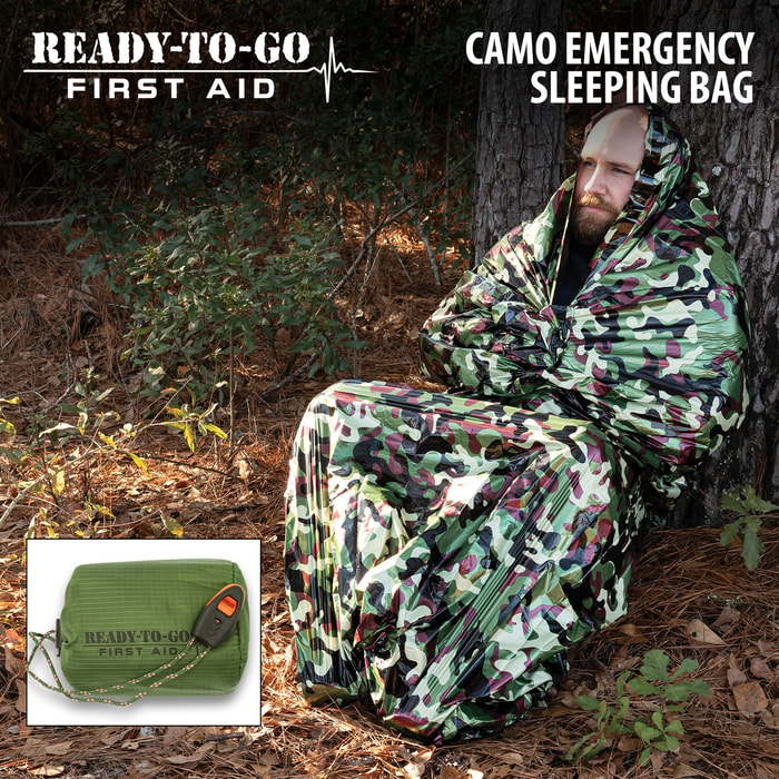 Full image of a person in the Ready-To-Go First Aid Camo Emergency Sleeping Bag.